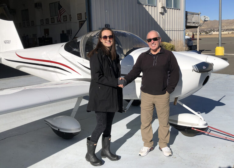 Flight instructor, Michaela Flint, Carson City, NV with student after successful check ride.